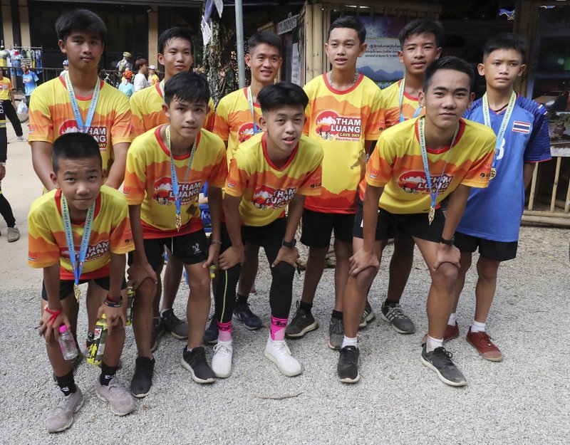 Thai boys rescued from cave mark anniversary with marathon