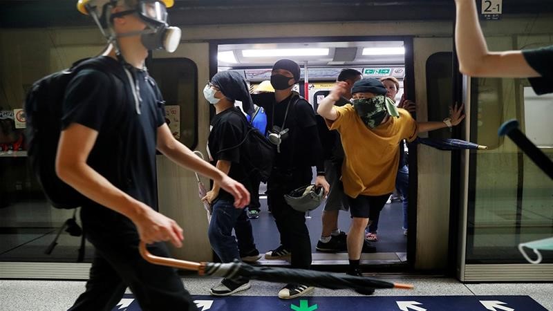 Hong Kong protesters disrupt train services