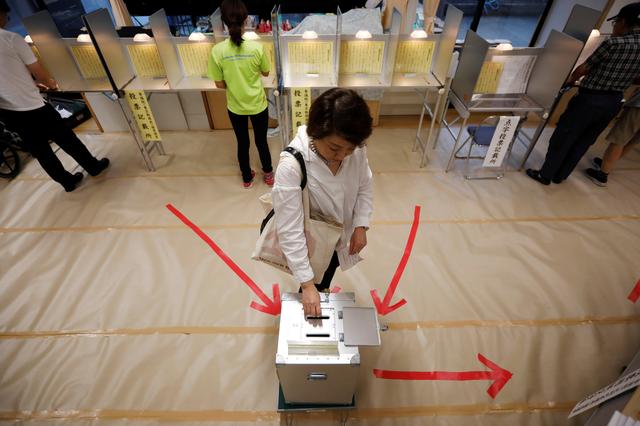 Pacifist constitution reform at stake as Japan goes to polls