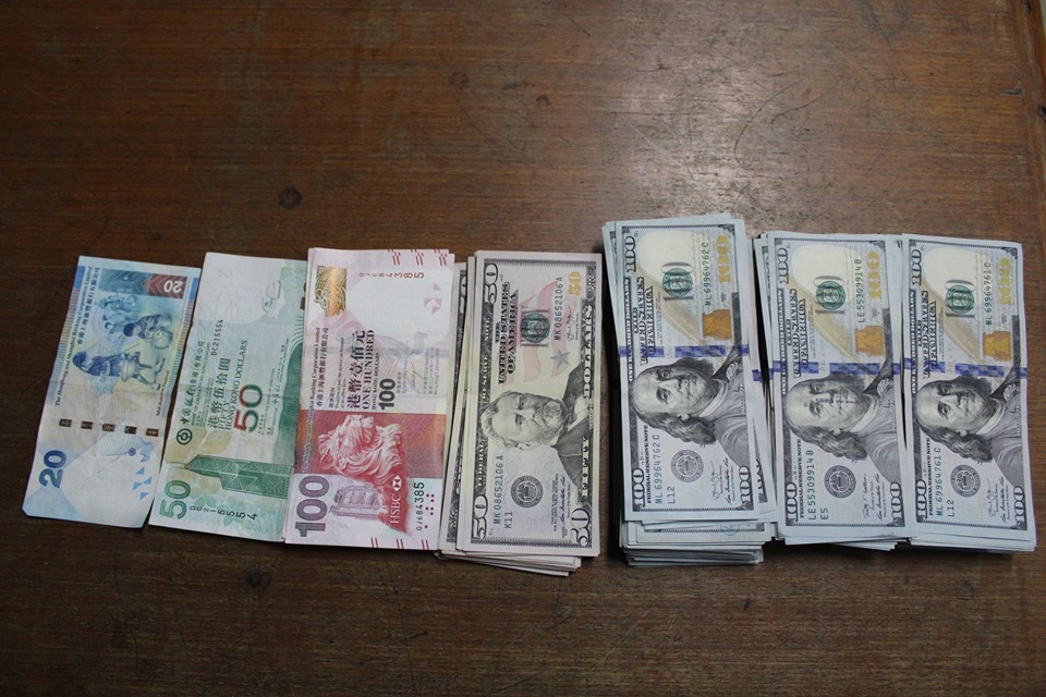 Man arrested with illegal US dollar bills