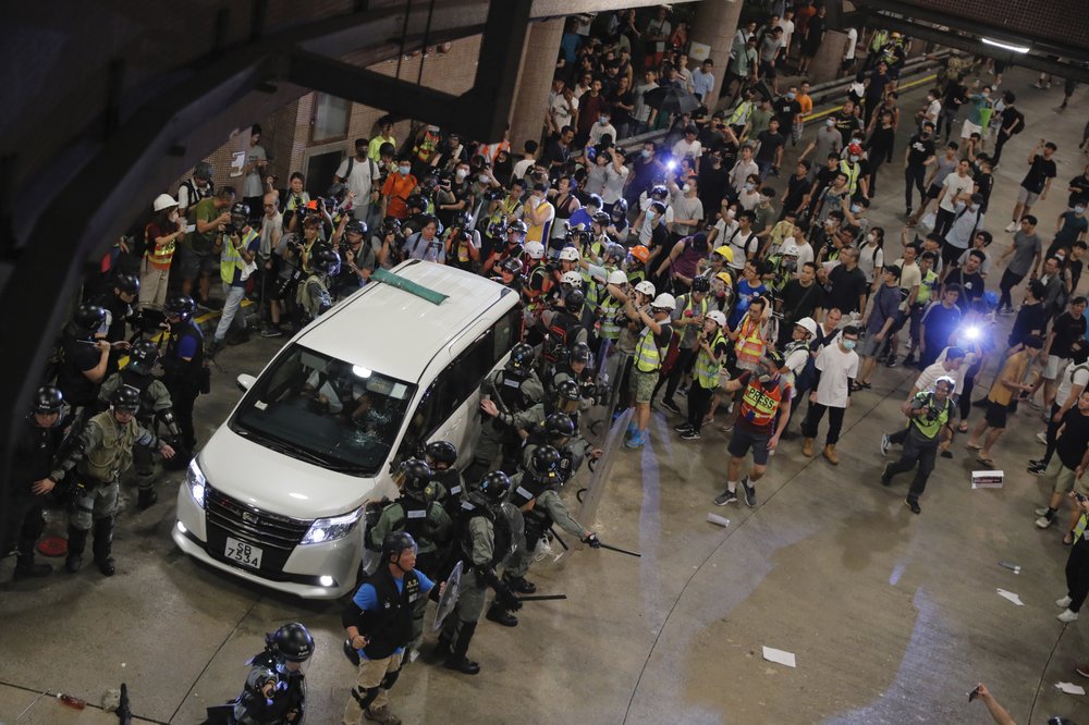 Hong Kong police arrest over 20 protesters