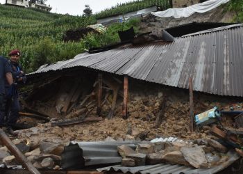 Families rendered homeless by landslide reconstruct houses