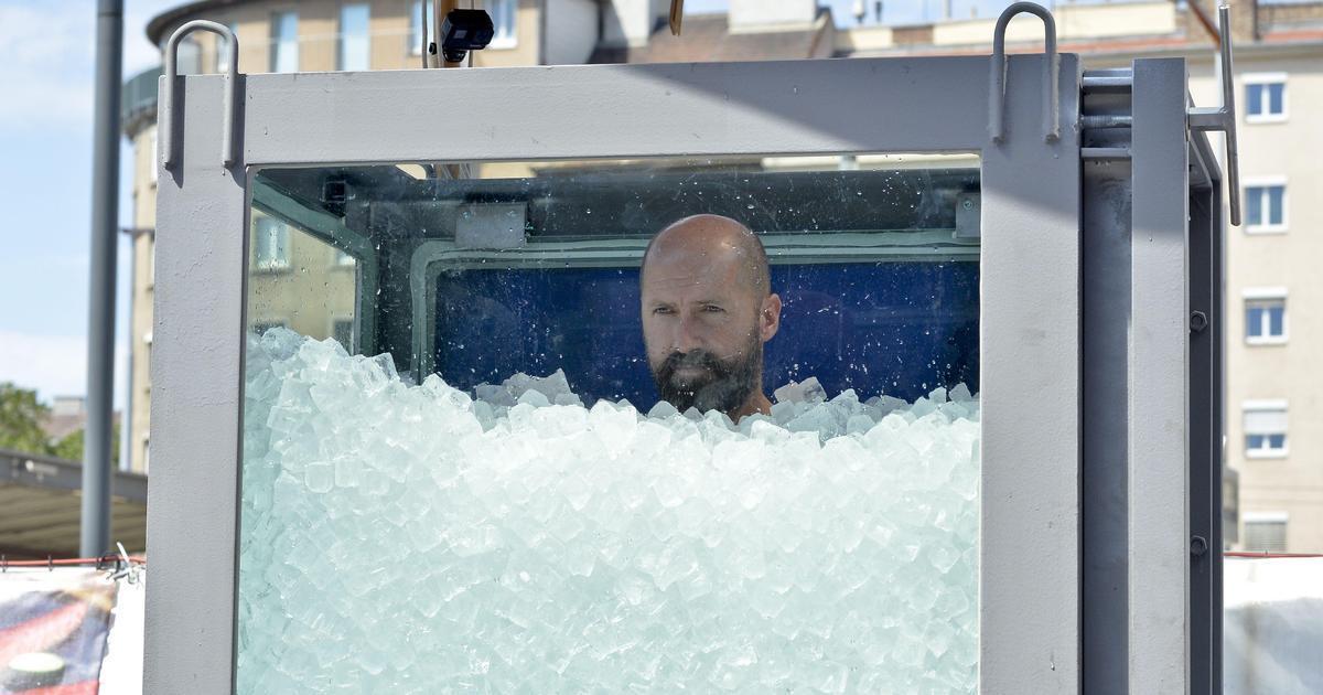 Austrian athlete spends two hours in box of ice to break Guinness record