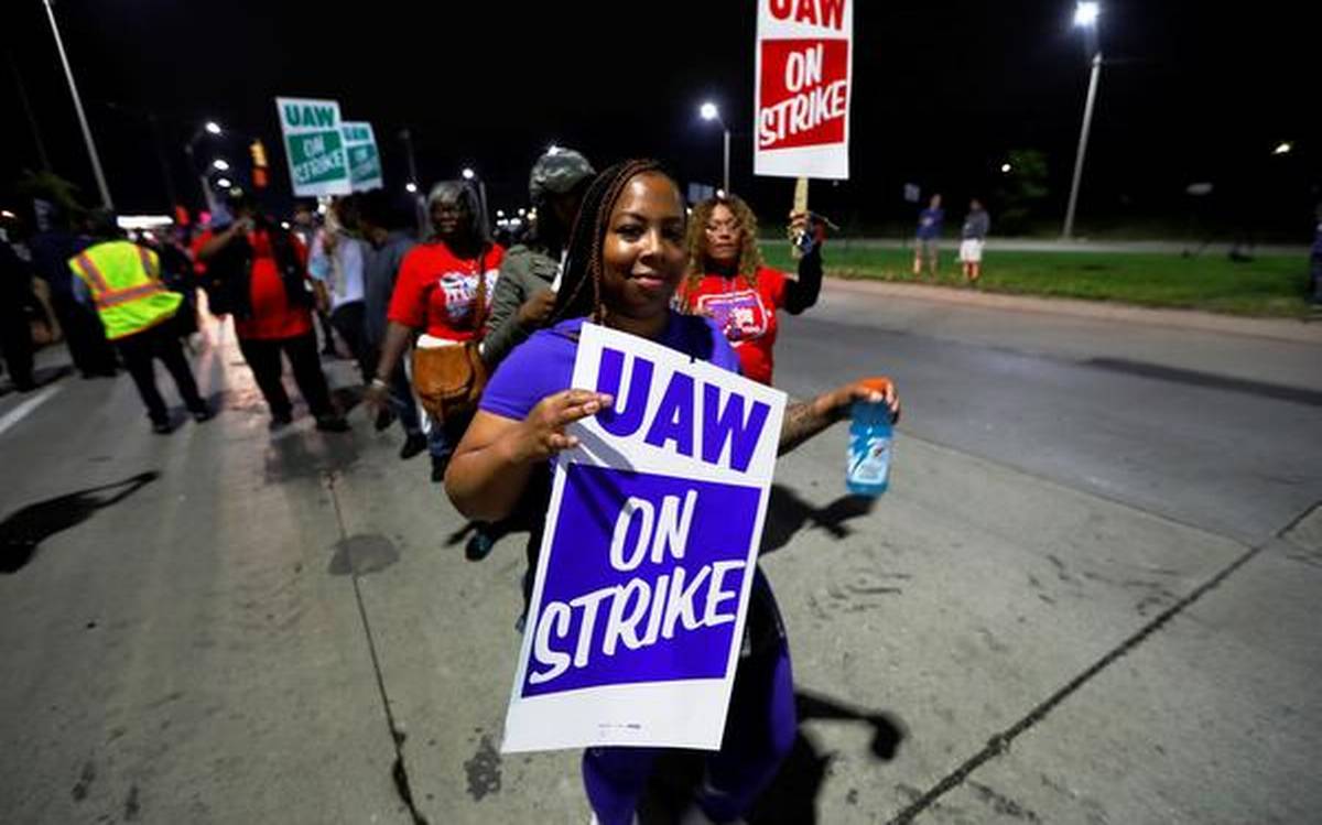 Nearly 50,000 GM auto workers go on strike for first time