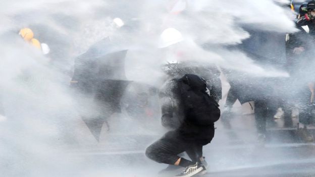 Petrol bombs and water cannon used in Hong Kong clashes
