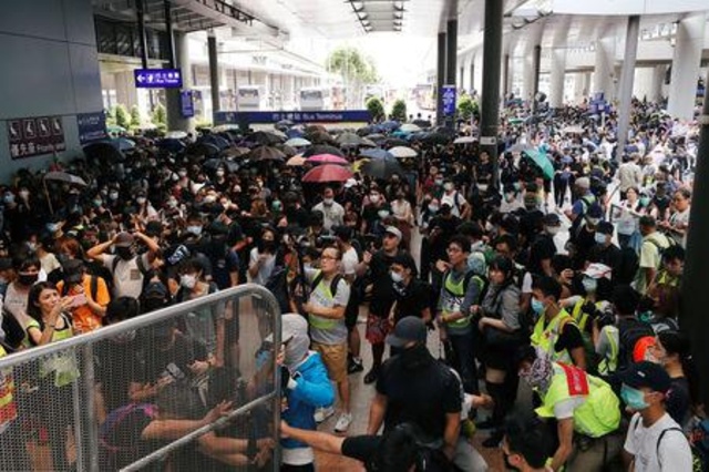 Protesters converge at Hong Kong airport