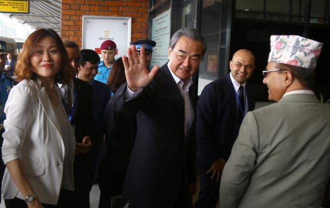 Chinese Foreign Minister Wang returns home