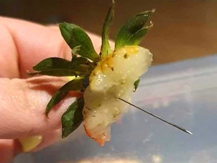 Australian woman hospitalised after needle found in strawberry
