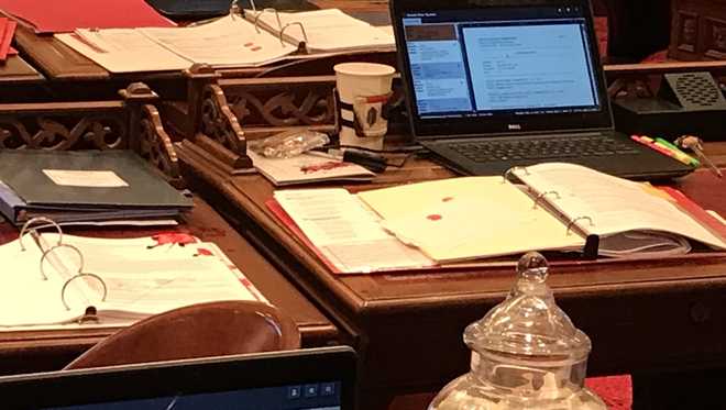 Woman arrested after throwing red liquid on California Senate