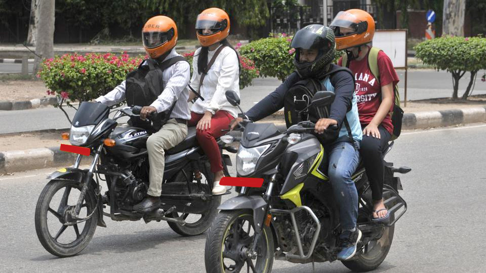 Govt working on a provision to make helmets compulsory for pillion riders