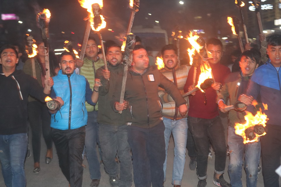 NSU organizes torch rally against border encroachment; 21 arrested
