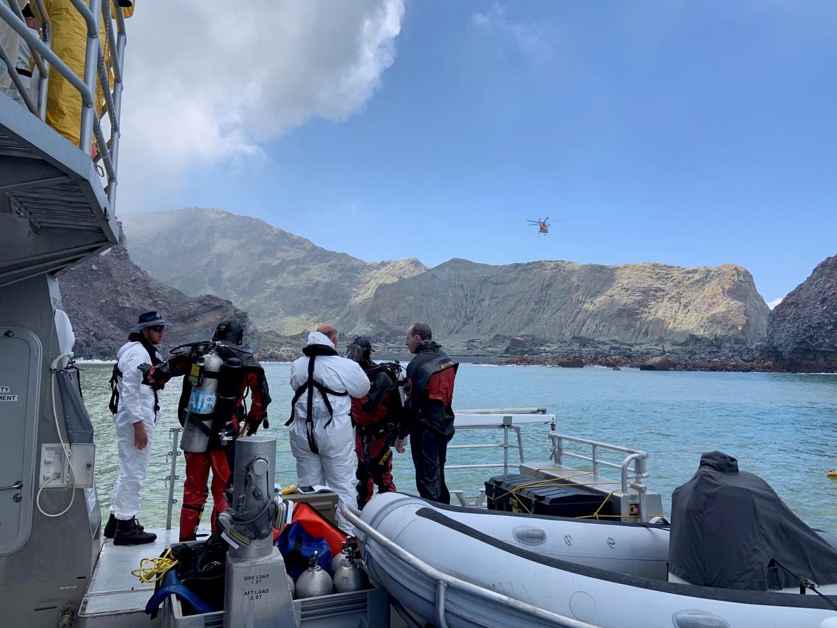 New Zealand divers search for volcano victims as death toll reaches 15