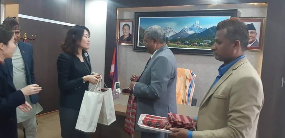 Photo of Chinese envoy gifting alcohol to Nepal’s minister goes viral