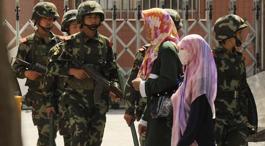 China detaining Uighur Muslims for beards, veils and internet browsing