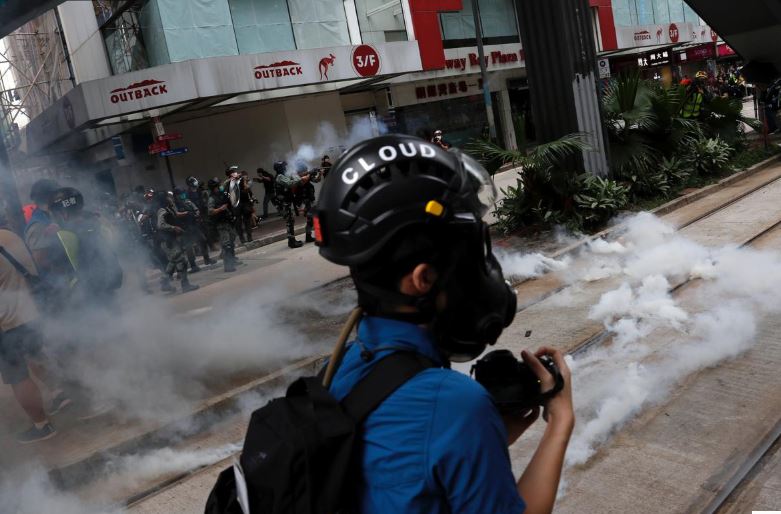 Hong Kong police fire tear gas shells on demonstrators