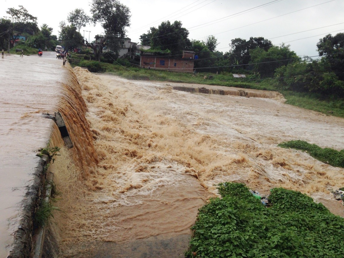 Flood sweeps hydro project canal; power production shut down