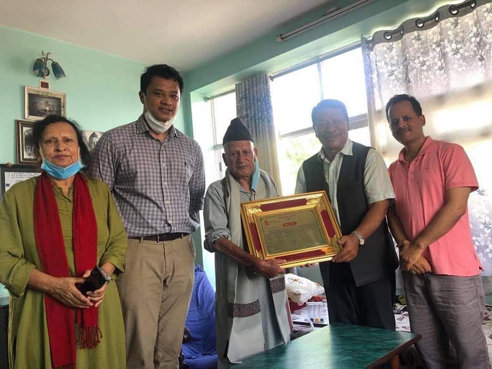 Kharel and Bade felicitated with ‘Ganesh Man Foundation Prajatantra Senani title’