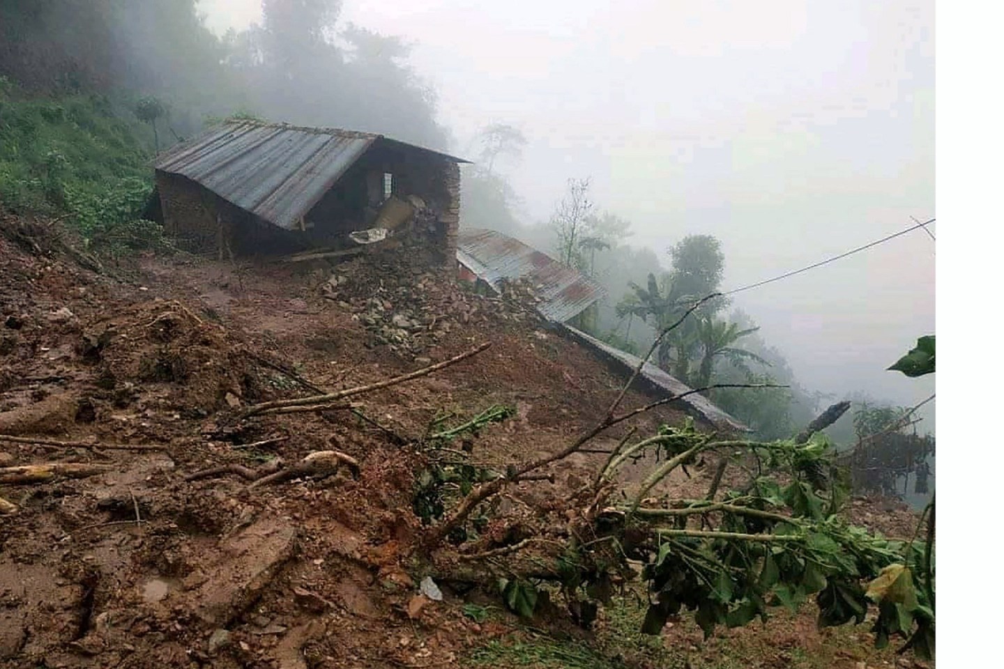 Child development center and house buried by landslide