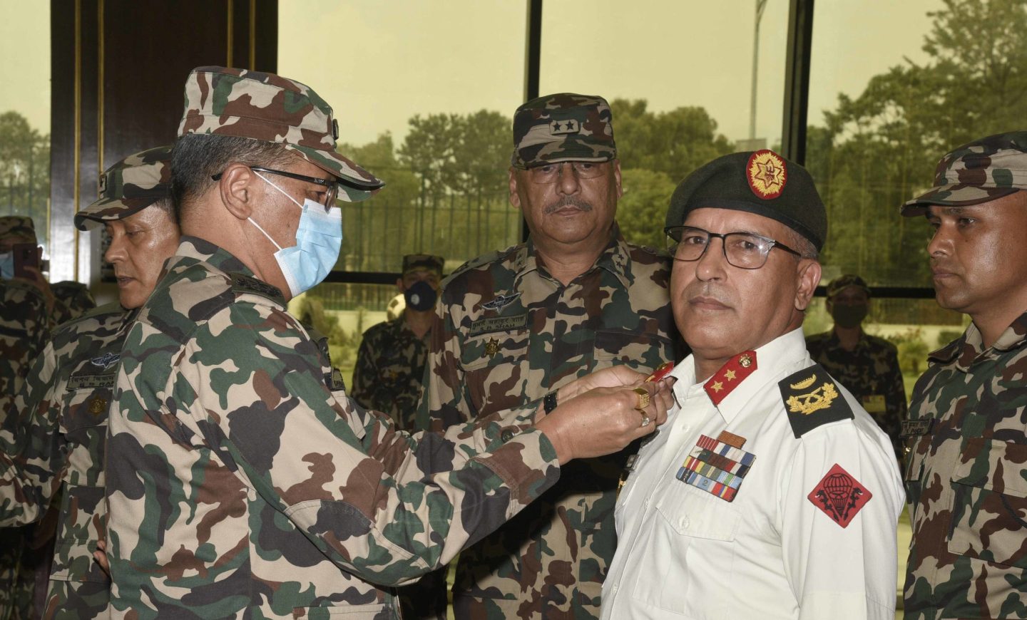 Insignia conferred on Major General Shahi, Brigadier General Pun