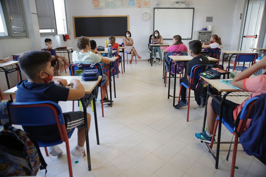 Italy’s initial virus hotspot back to school after 7 months