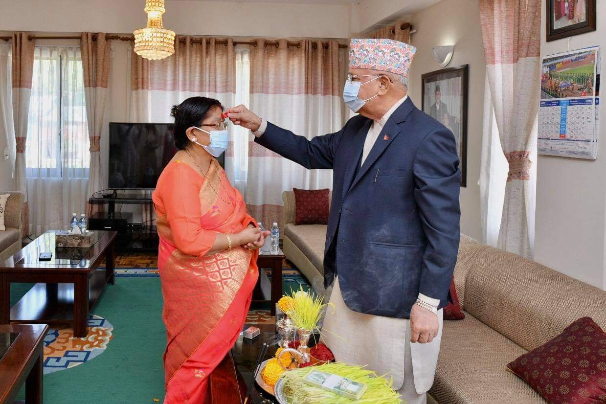PM Oli offers Dashain tika to spouse Radhika Shakya