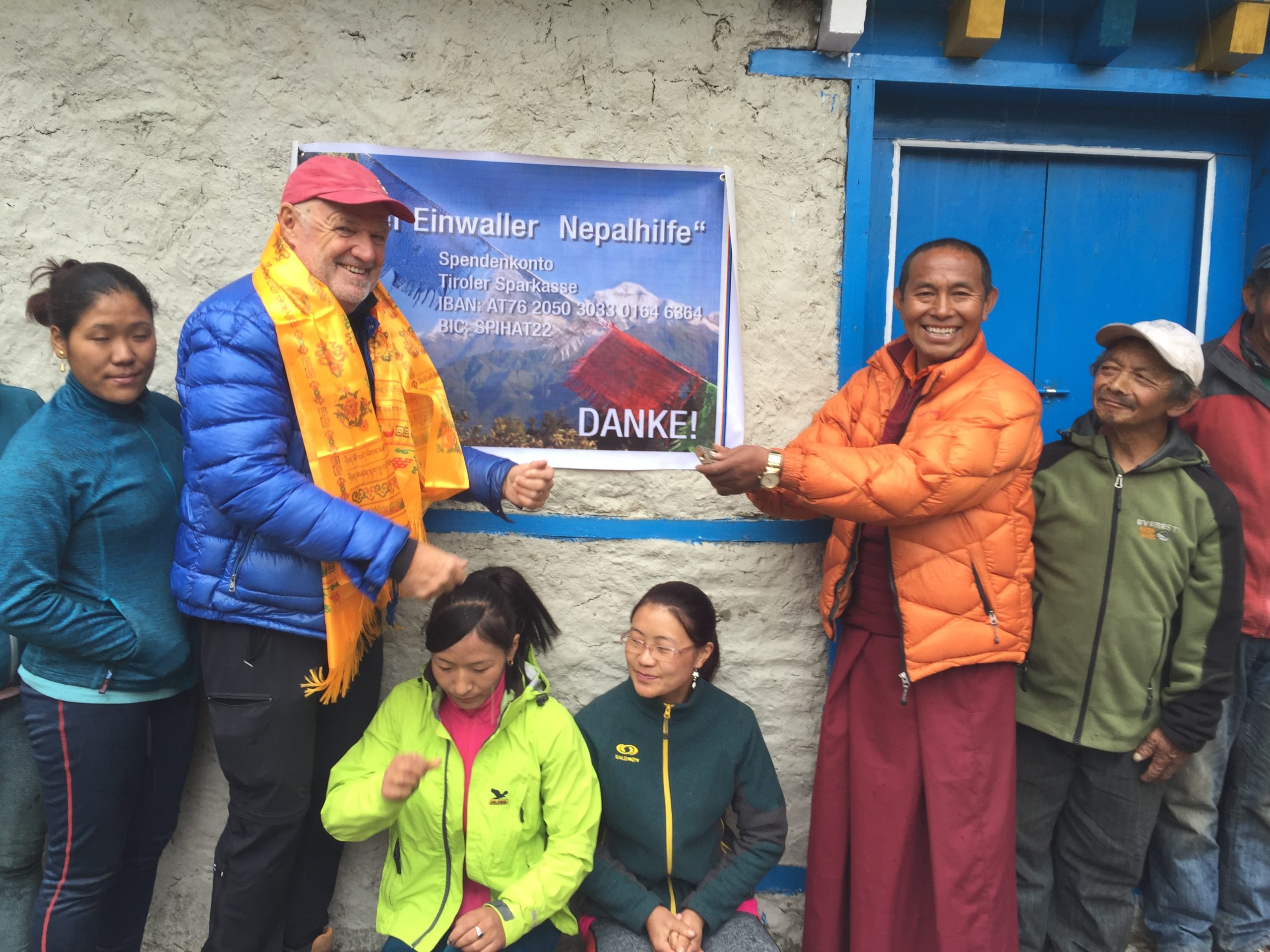Record-holder climber Phurba Tenzing Sherpa hands over health post building constructed in Beding