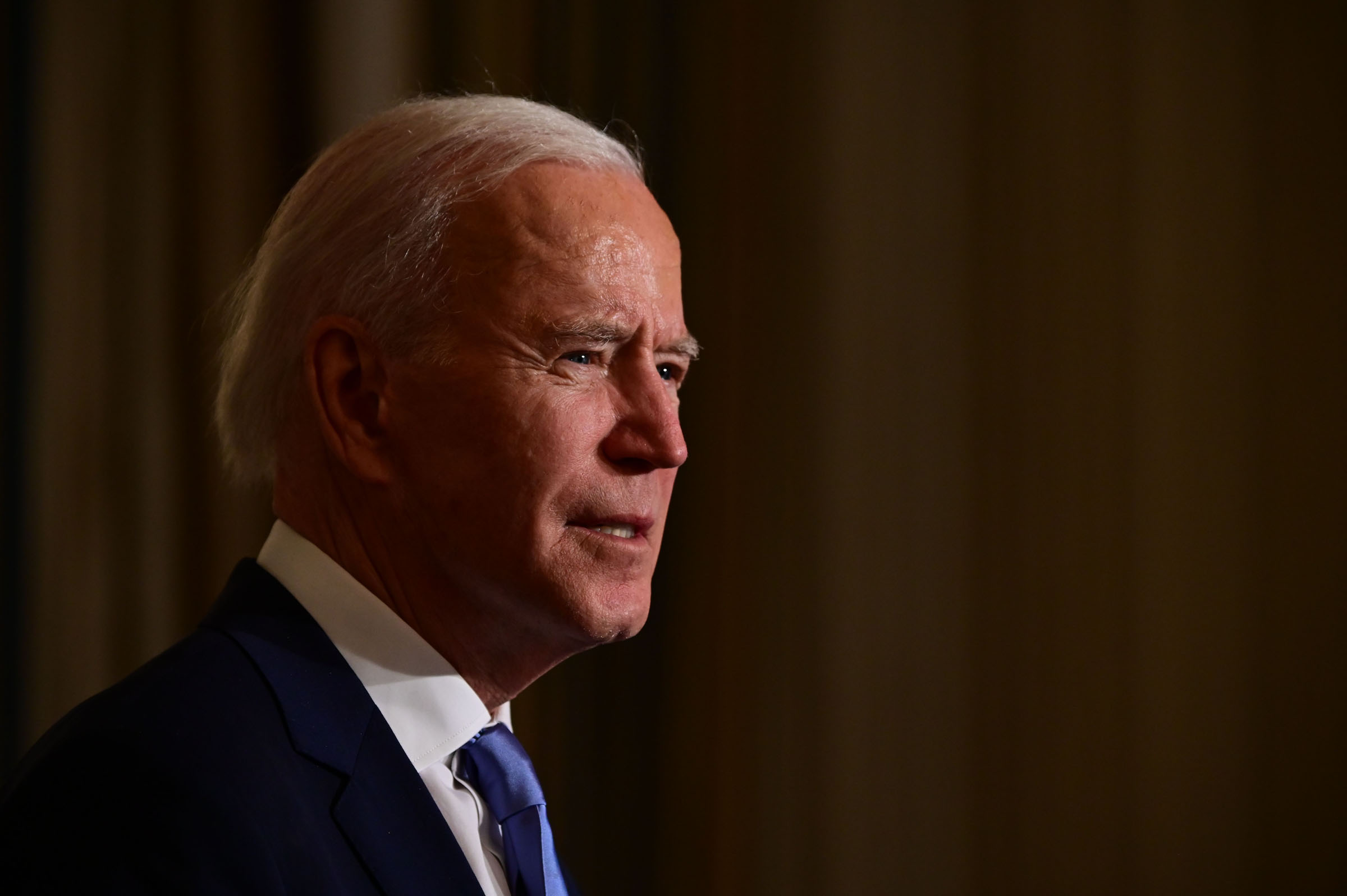 Biden unveils sweeping COVID-19 plan in first full day in office