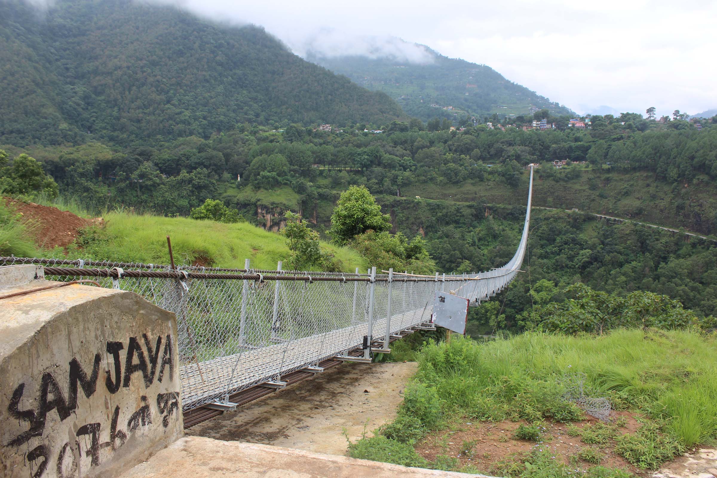 Two suspension bridges being constructed daily