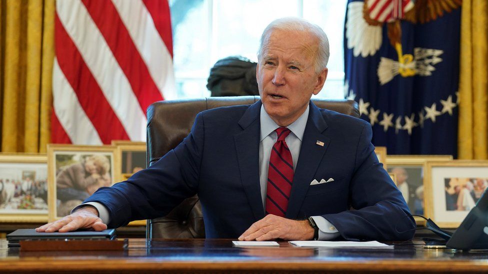 US President Biden tightens travel rules amid new Omicron cases