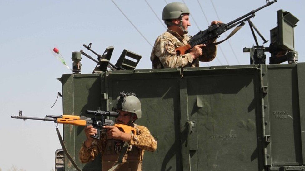 Fighting rages as Taliban besiege three key Afghan cities