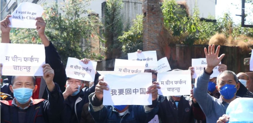 Chinese citizens protest outside China’s Embassy in Kathmandu demanding prompt return to home