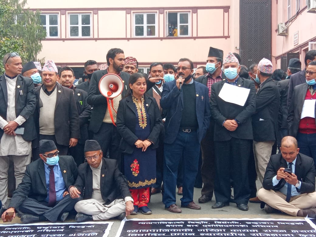 Agitating lawyers handing over letter of attention to political parties today
