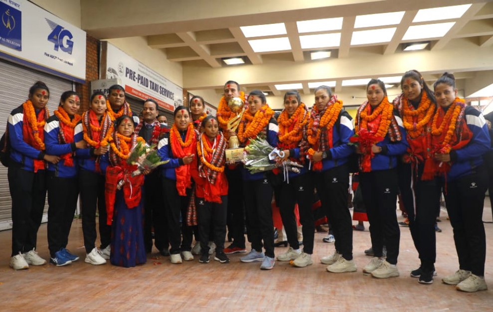 Nepali volleyball championship team returns home