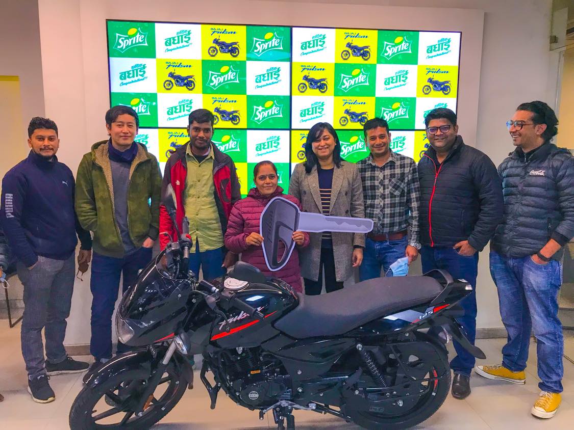 Bajaj Pulsar 125 cc motorcycles handed over to four lucky winners