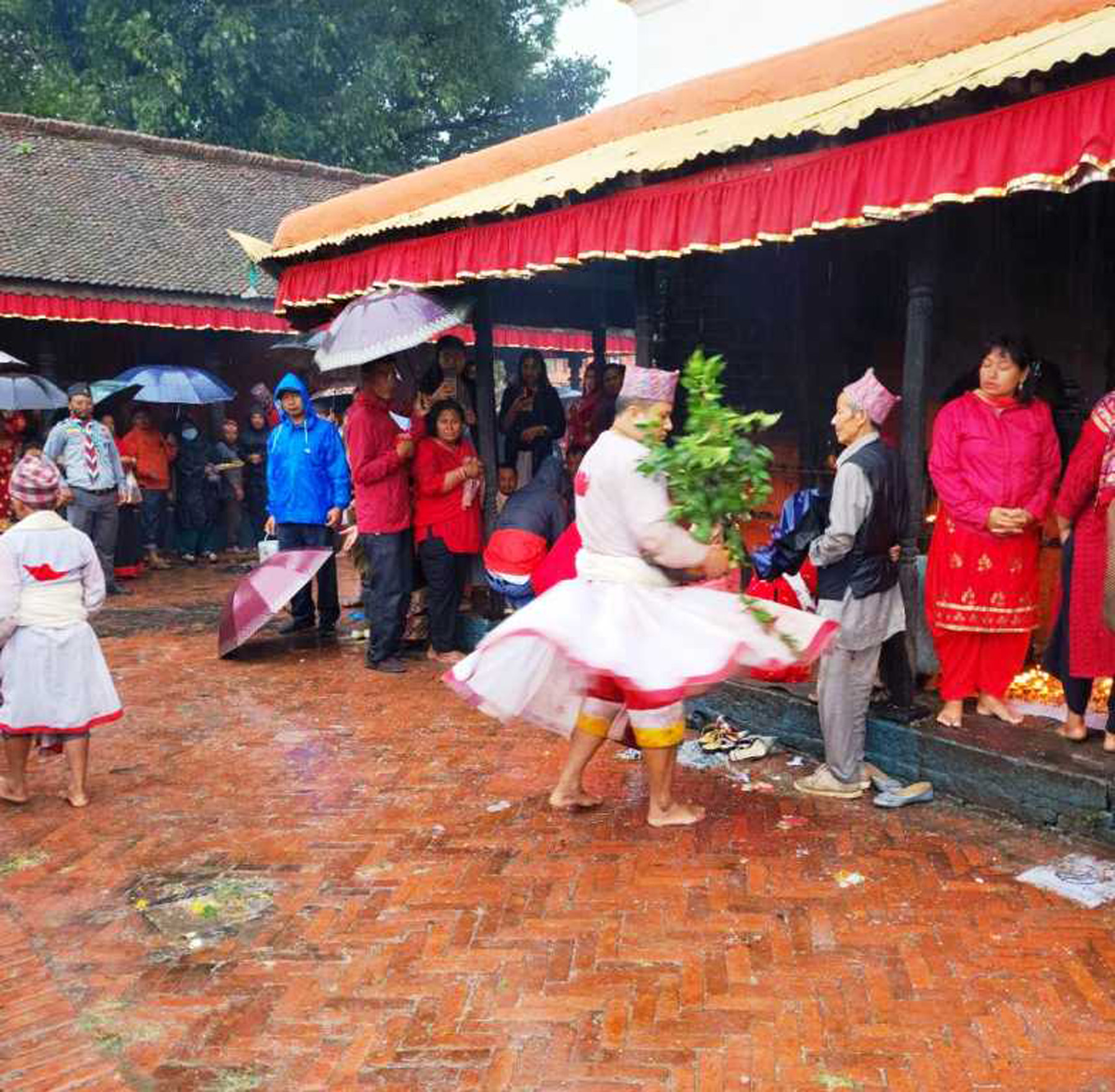 Devotees resist rain to worship at Brahmayani Temple in Bhaktapur