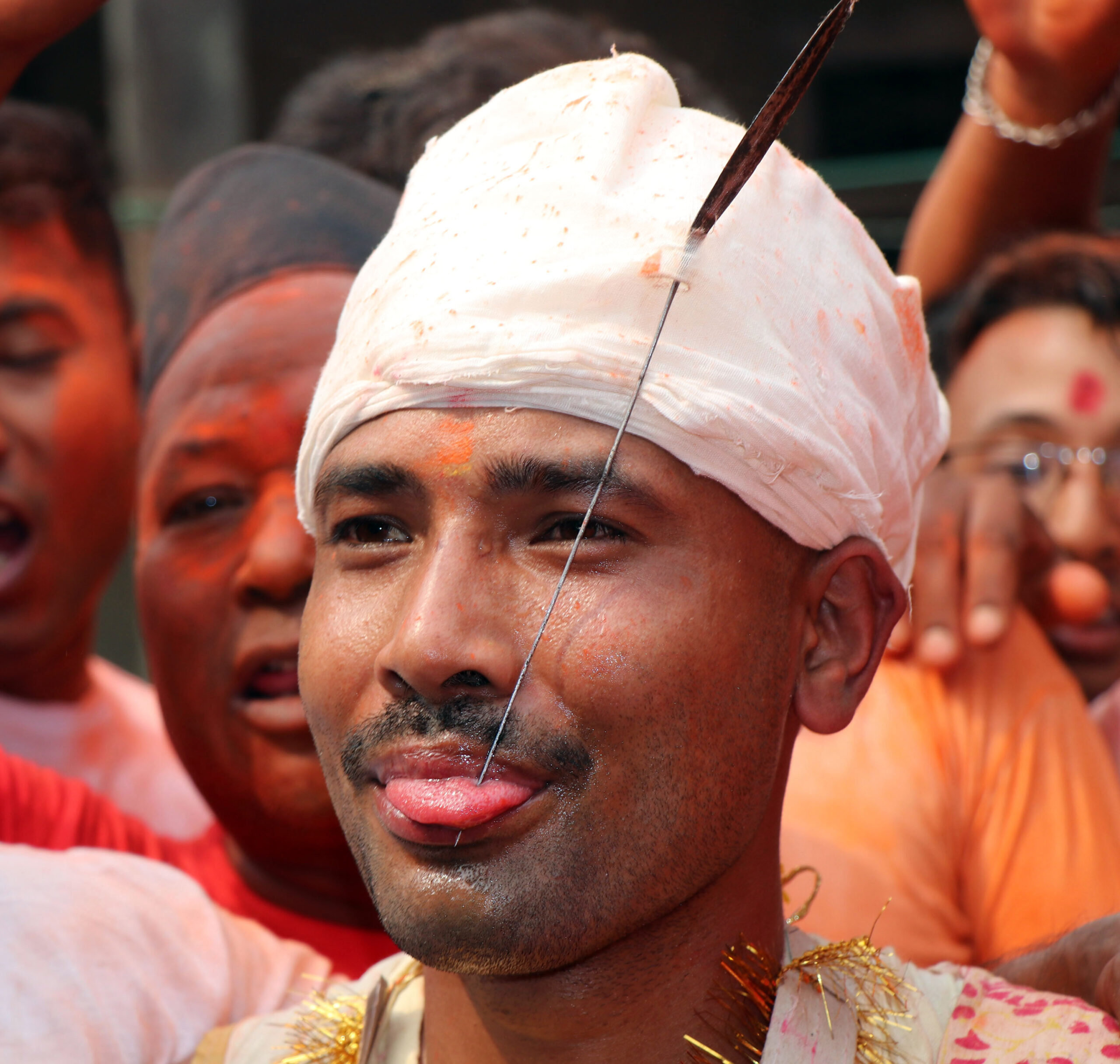Sujan, 28, pierces tongue for second time on Bisket Jatra