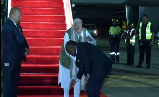 Papua New Guinea’s Marape touches Indian PM Modi’s feet